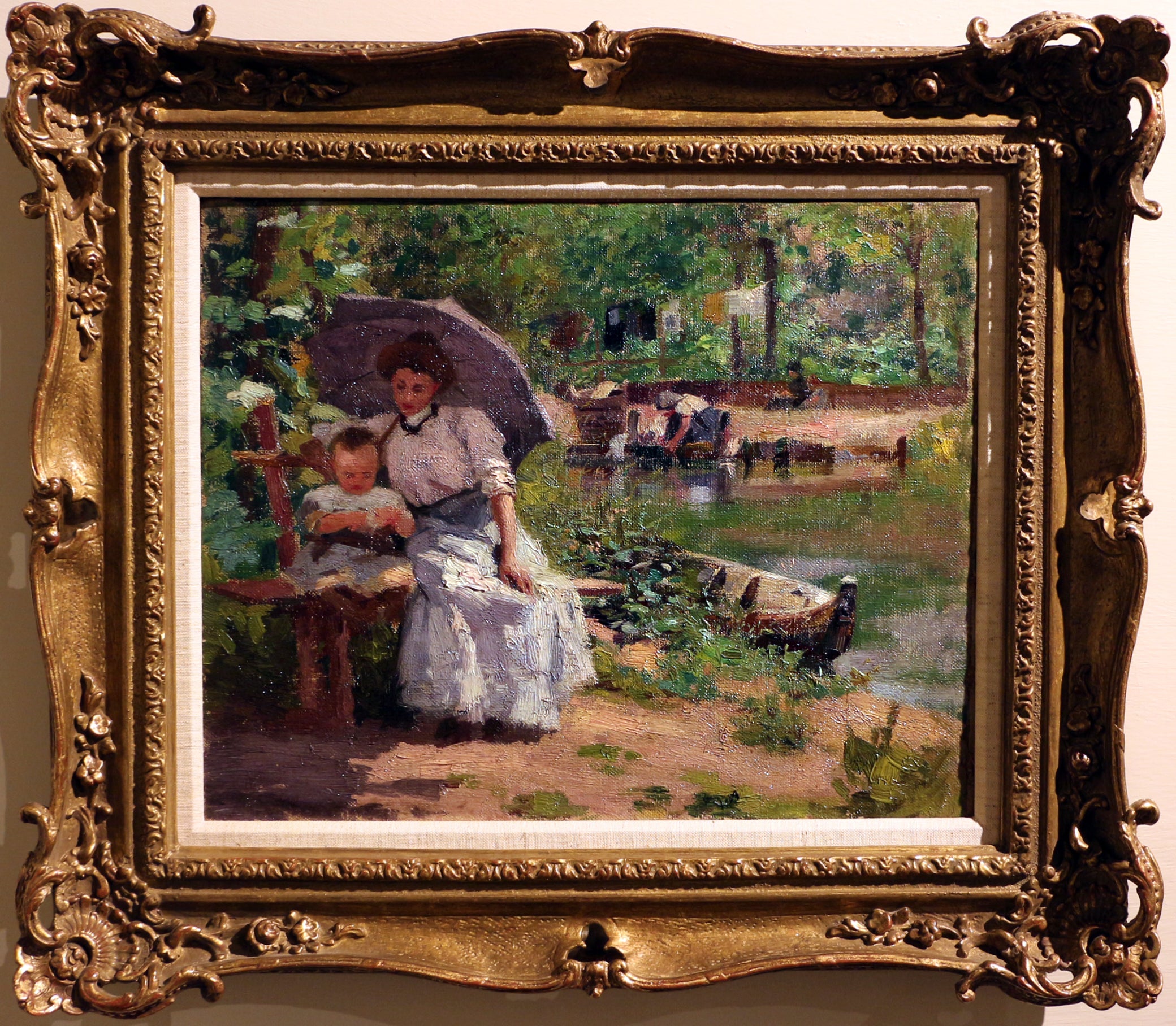 Kvinde med barn siddende i en skov - Federico Zandomeneghi