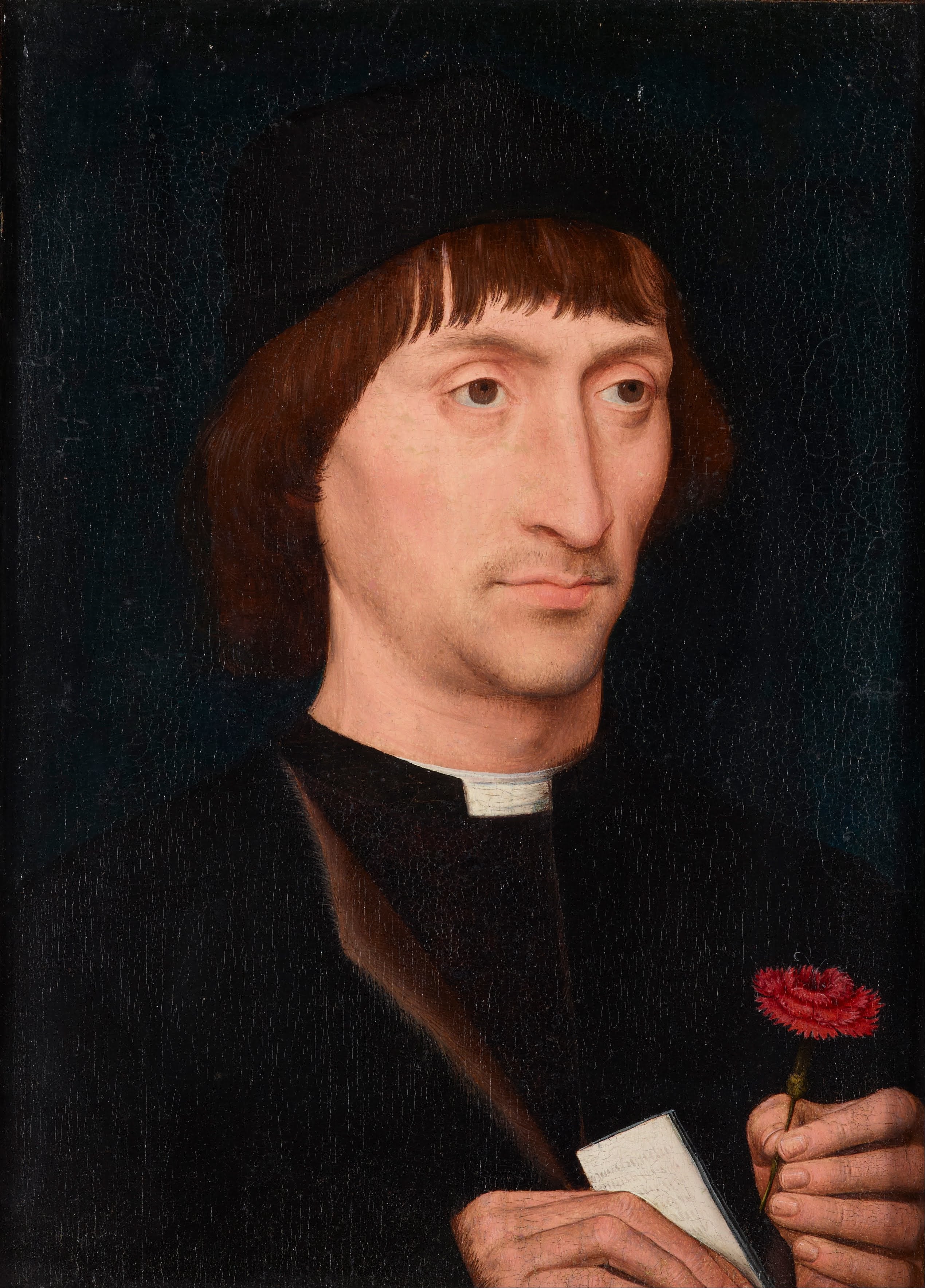 Portræt af en mand med en rose - Hans Memling