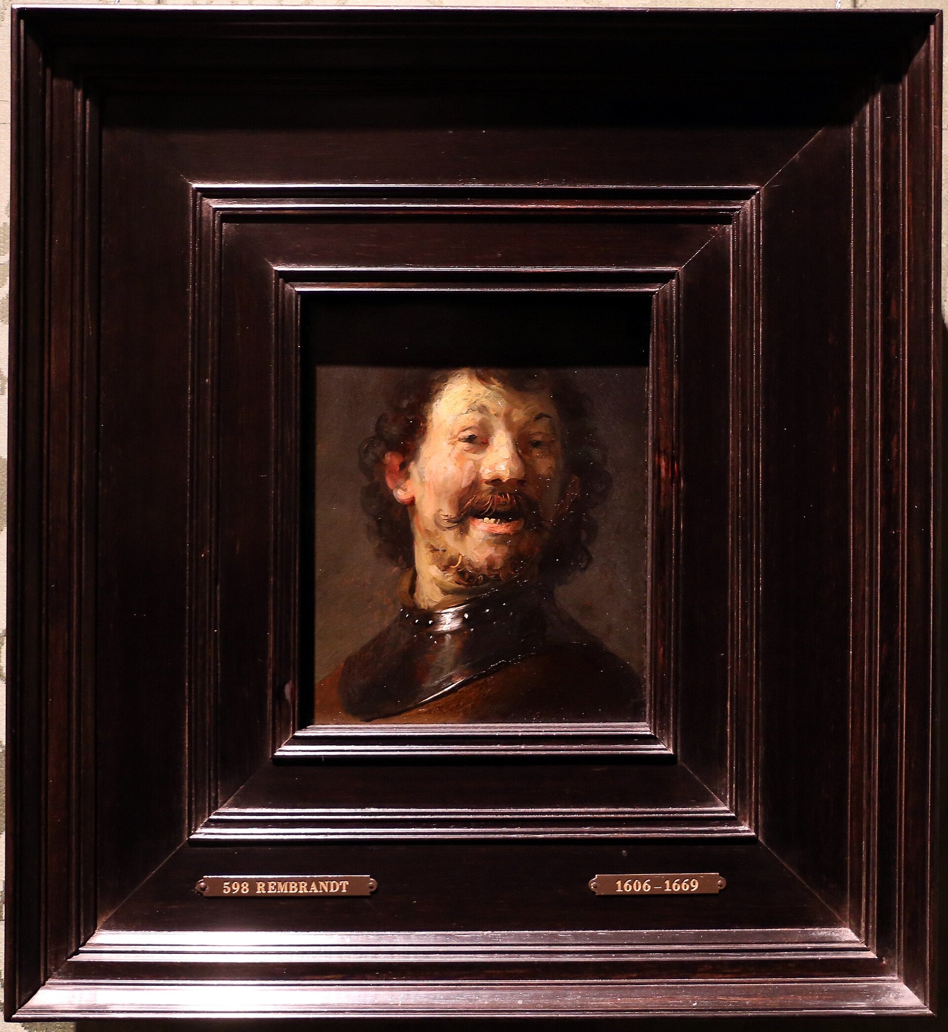 Latterende mand - Rembrandt