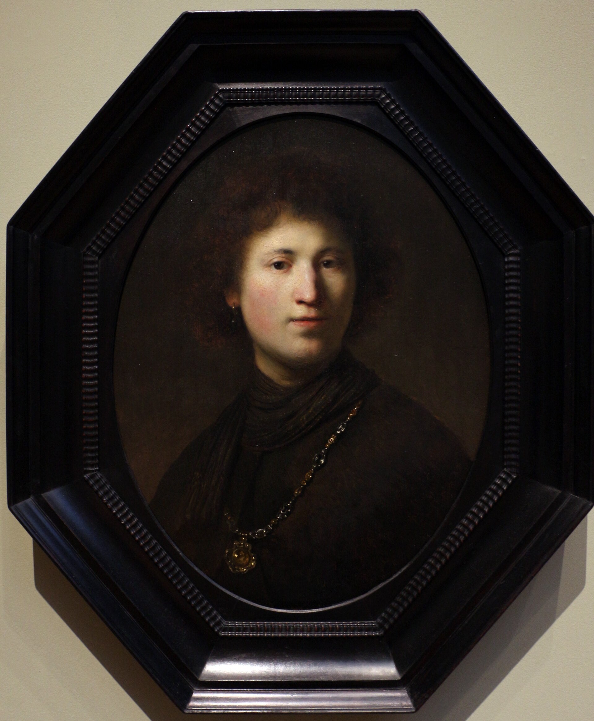 En ung mand med en kæde - Rembrandt