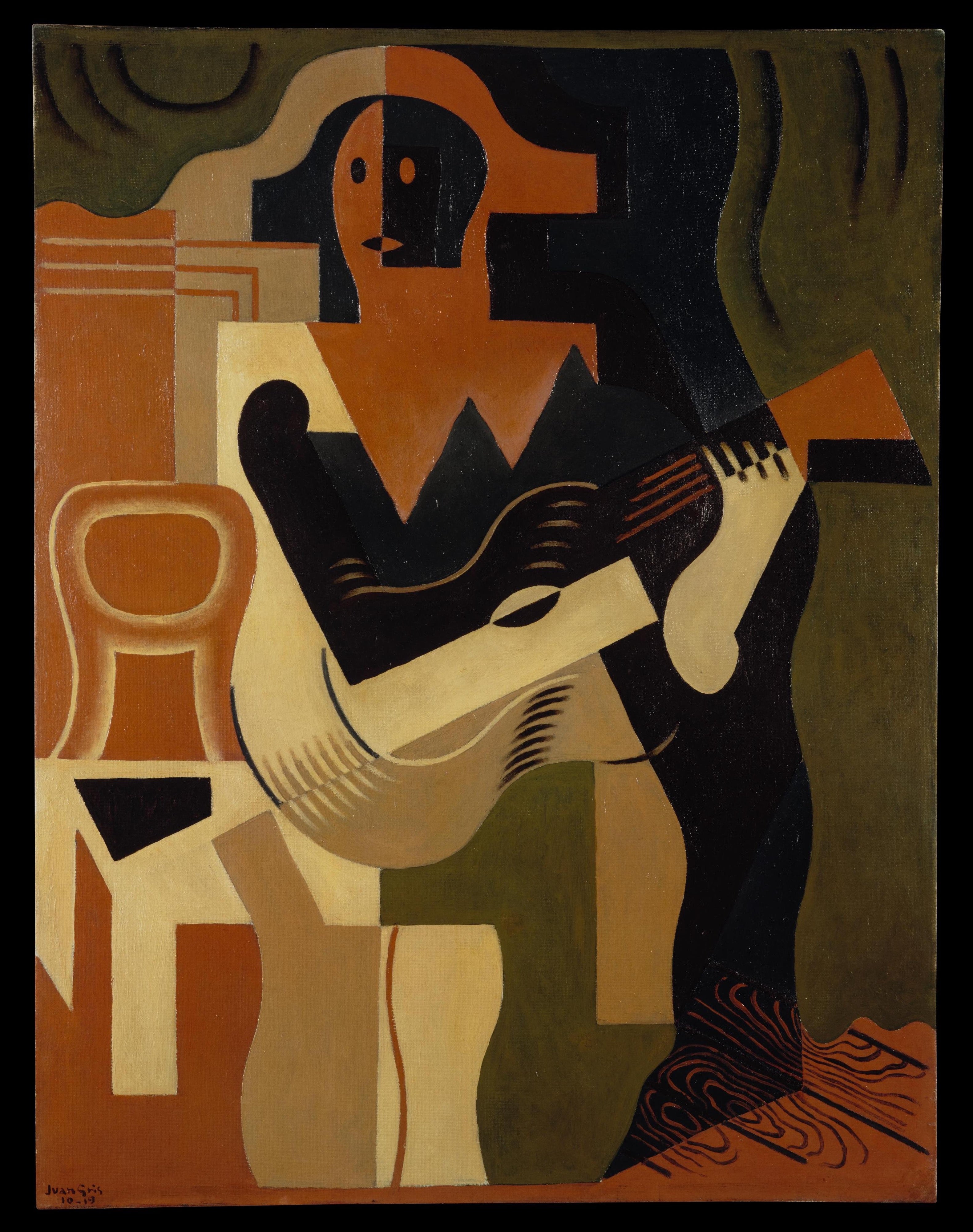 Arlequin siddende med en guitar - Juan Gris