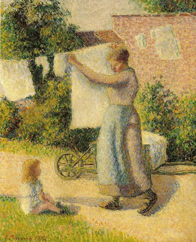 Kvinde der hænger tøj op - Camille Pissarro