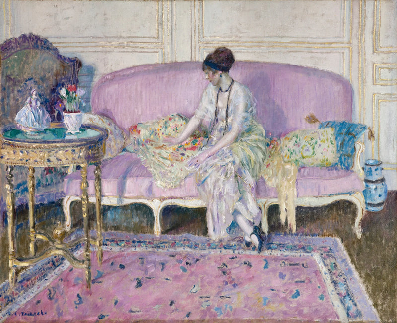Kvinde sidder på en sofa indendørs - Frederick Carl Frieseke