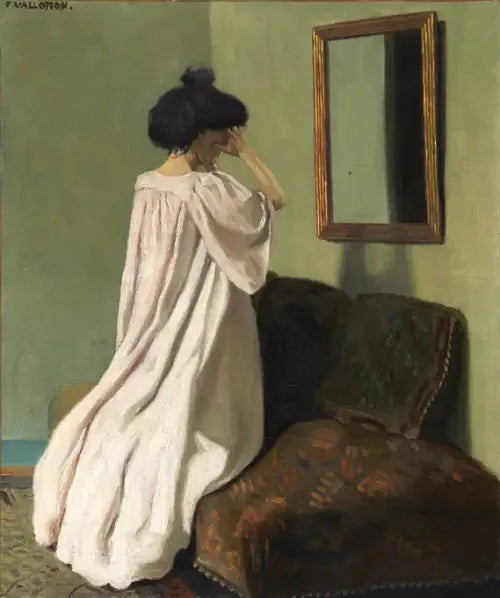 Gabrielle Vallotton knælende foran et spejl på sofaen i værkstedet på rue des Belles-Feuilles - Félix Vallotton