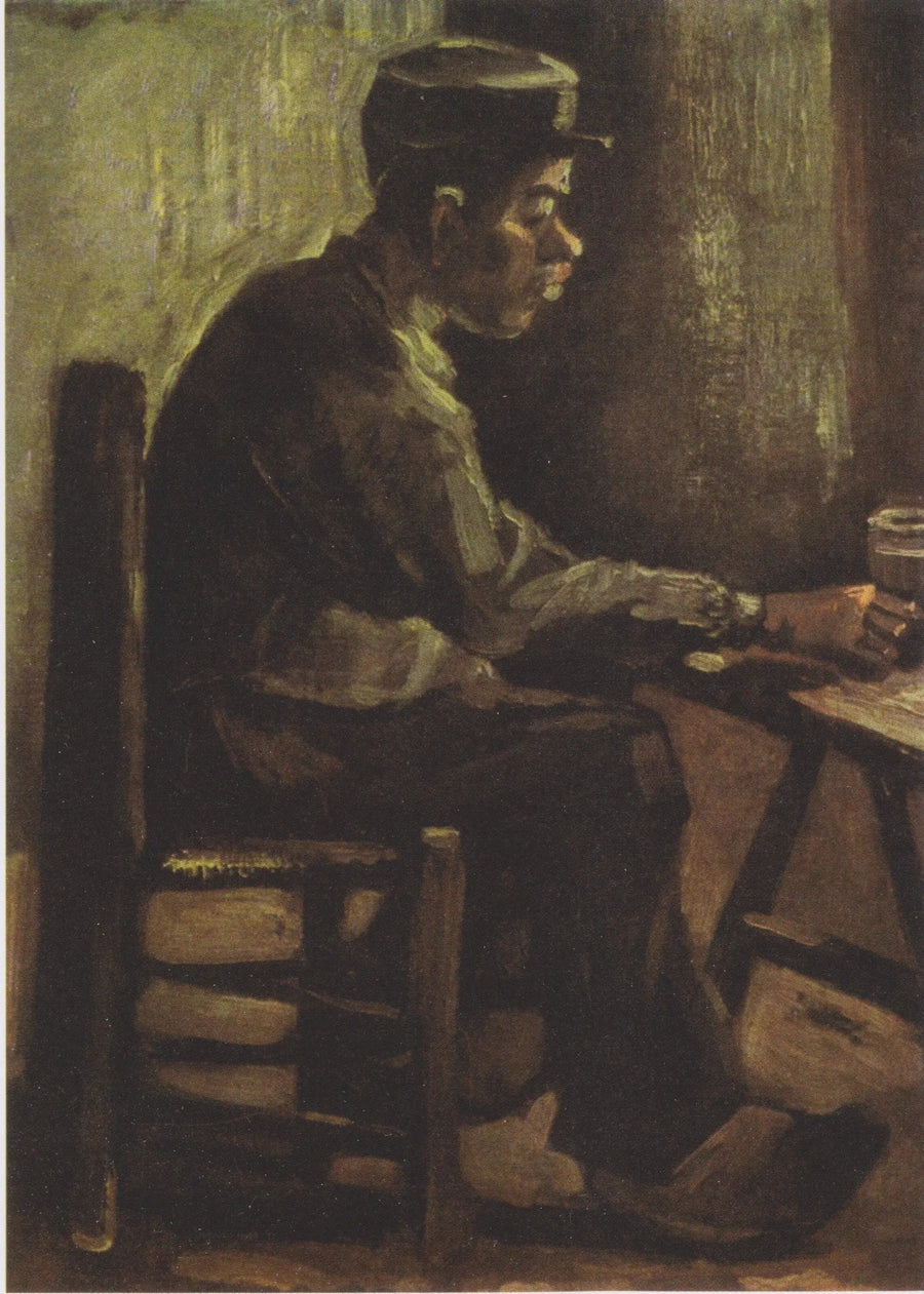 Mand ved et bord - Vincent van Gogh