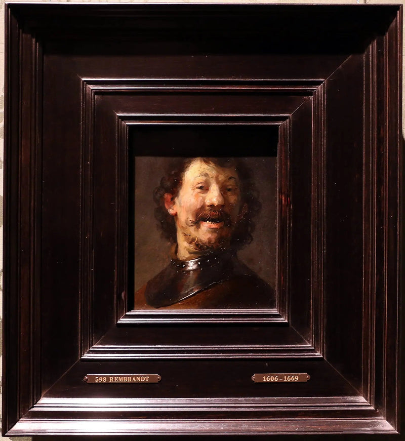 Latterende mand - Rembrandt