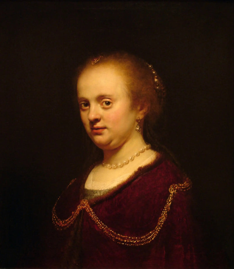 Ung kvinde med en guld kæde - Rembrandt