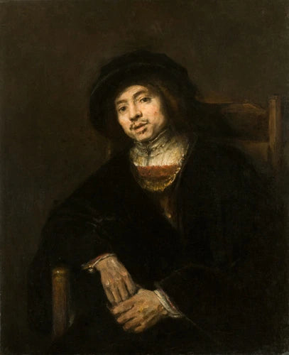 Portræt af en ung mand i en stol - Rembrandt