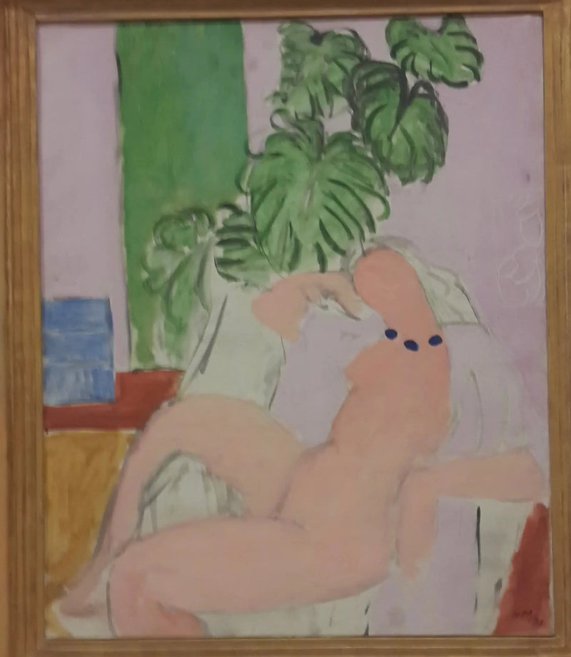 Nu i en stol, grøn plante - Henri Matisse