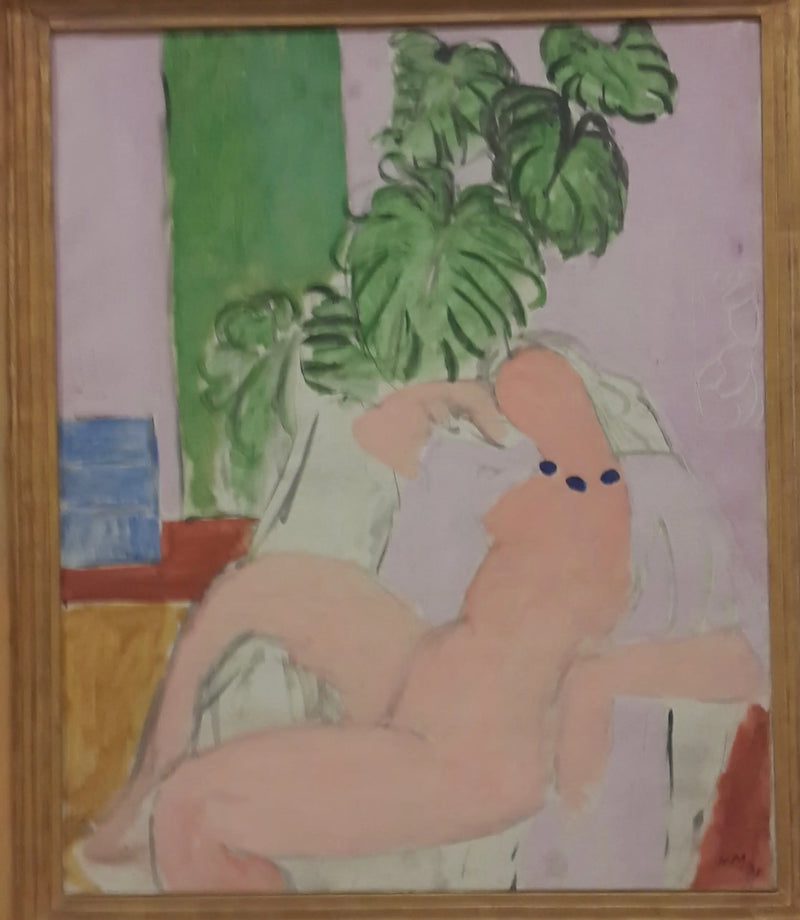 Nu i en stol, grøn plante - Henri Matisse