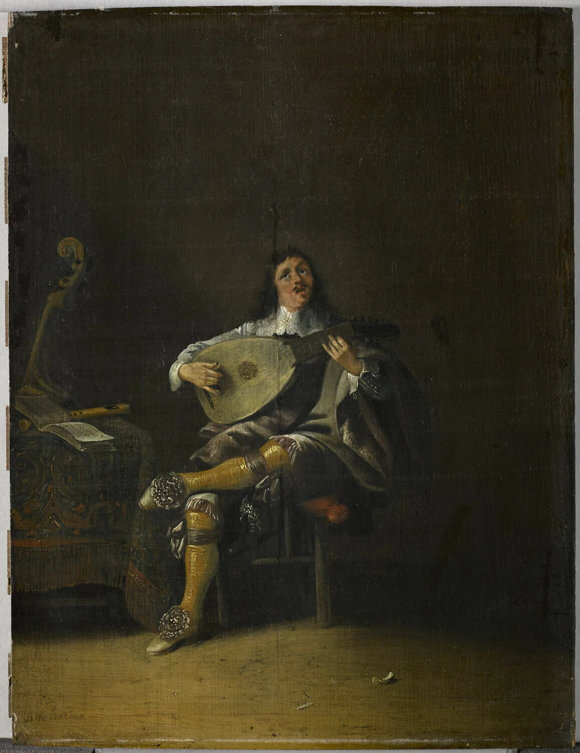 L'Ouïe : homme jouant de la guitare - Anthonie Palamedesz.