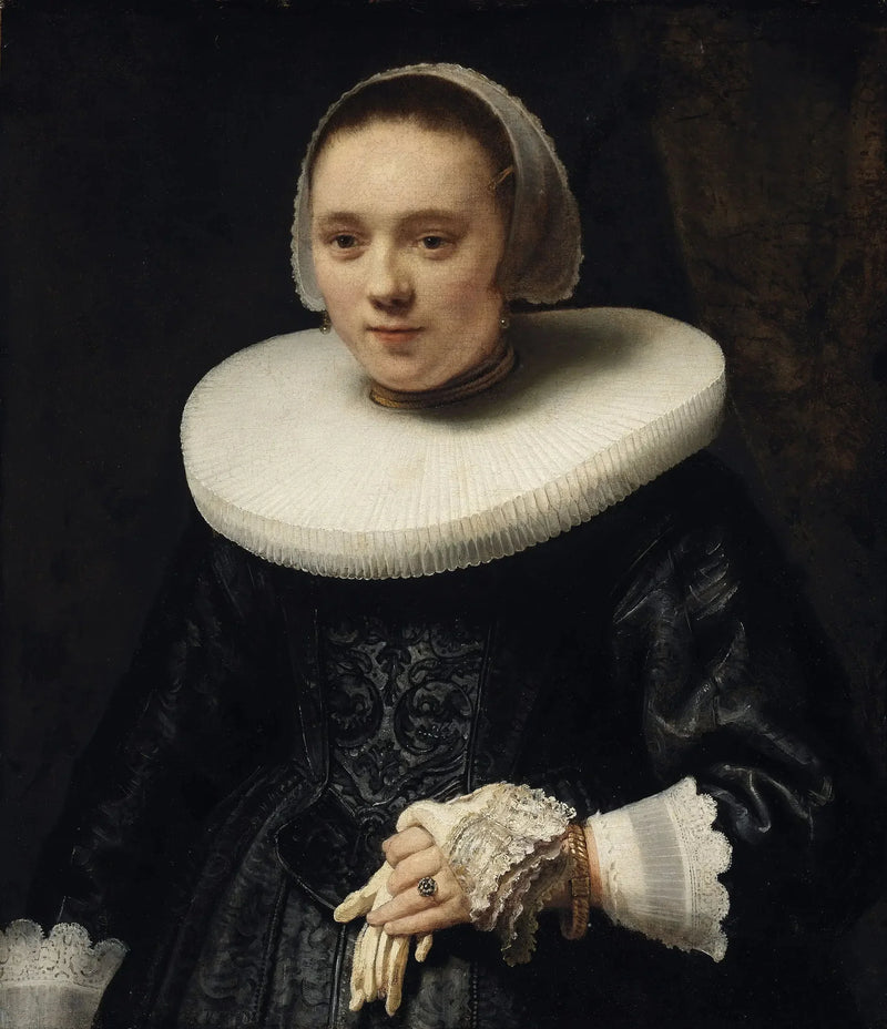 Portræt af en kvinde med handsker - Rembrandt