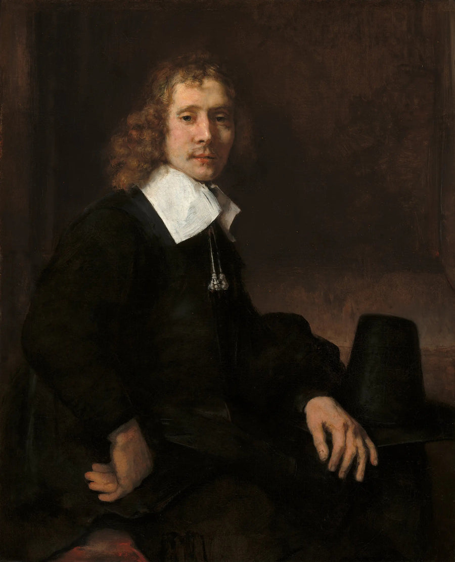 En ung mand siddende ved et bord (måske Govaert Flinck) - Rembrandt