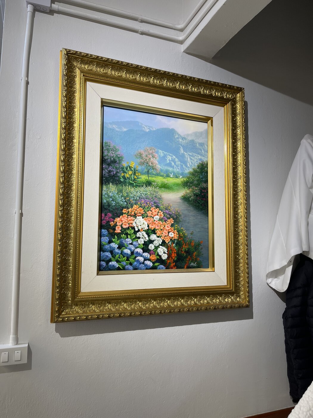 Flower garden landscape in a gold frame